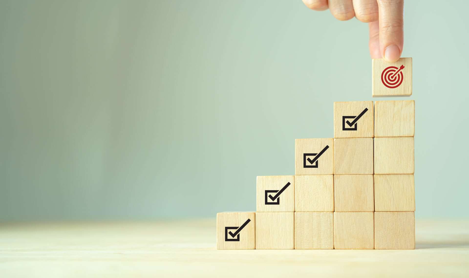 Securing Email: SPF, DKIM, and DMARC Explained 3 Corporate regulatory and compliance. Goals achievement and business success. Project and goals tracking. Task completion. Managing project timeline. Holding wooden cube with target achievement